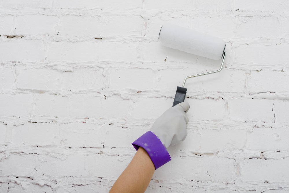 The Impact of Waterproof Paint for Walls on Home Improvement: Enhancing Property Value